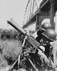 Machine gun crew guard bridge during Tennessee Maneuvers